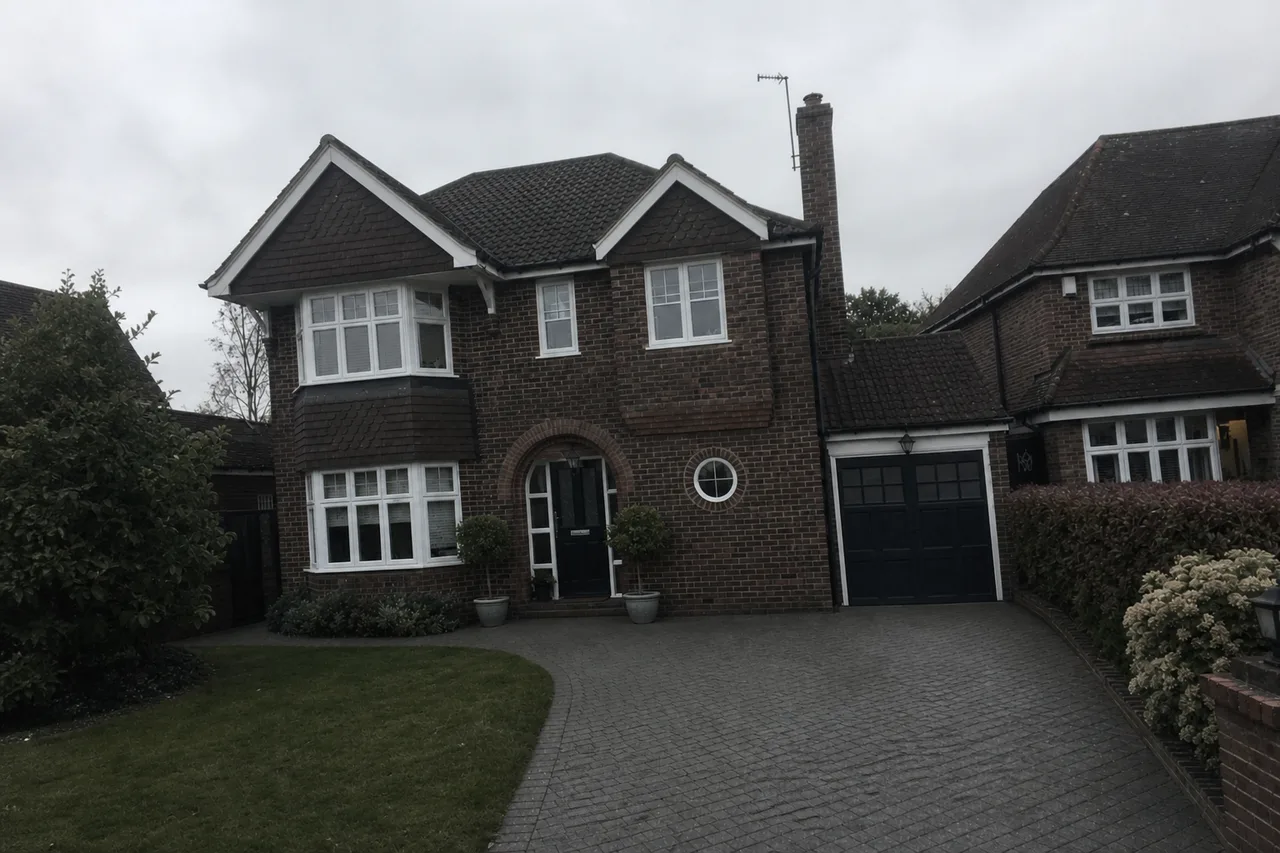 The same house on a flat grey afternoon